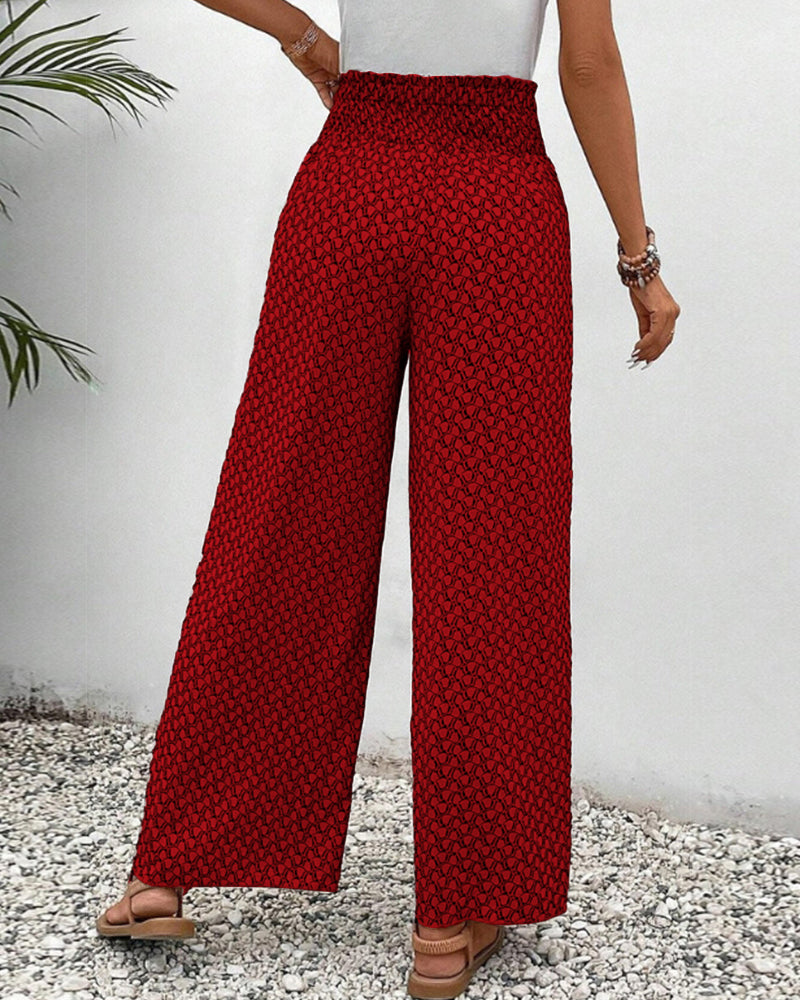 Zoom sur le tissu du pantalon femme large à imprimé géométrique