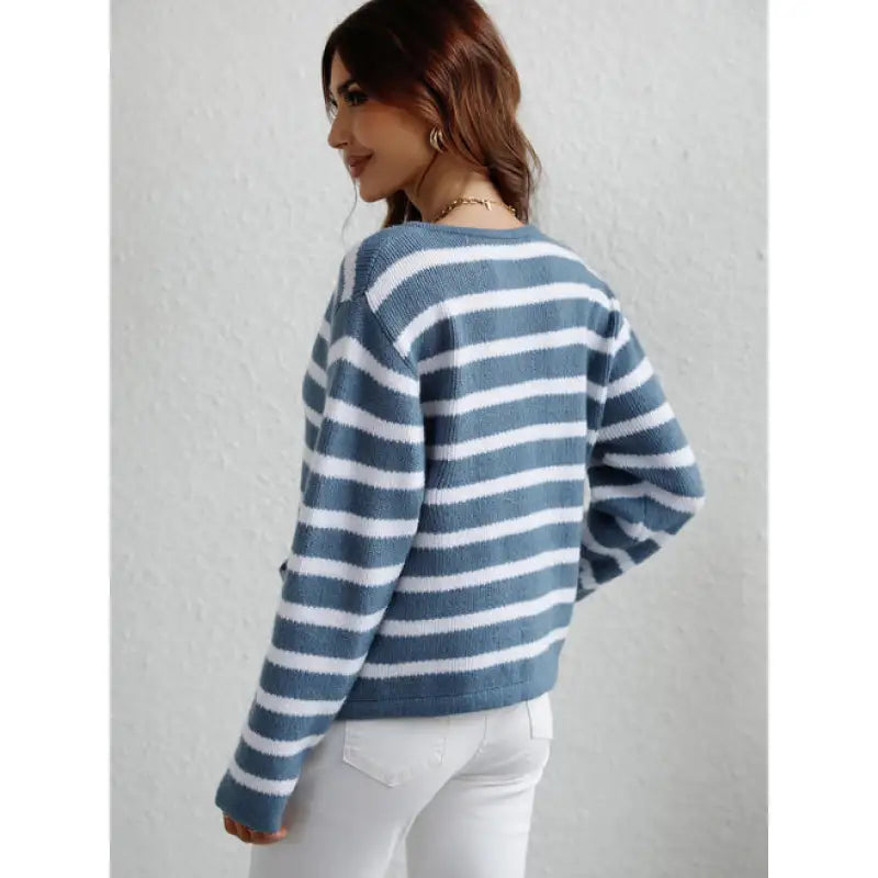 Pull en maille chunky confortable avec boutons et poches latérales