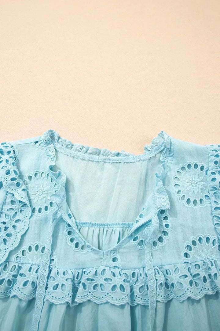 Blouse à manches bouffantes avec bordure en dentelle à œillets pour femmes