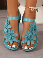Sandales femme à fleurs portées, style estival décontracté