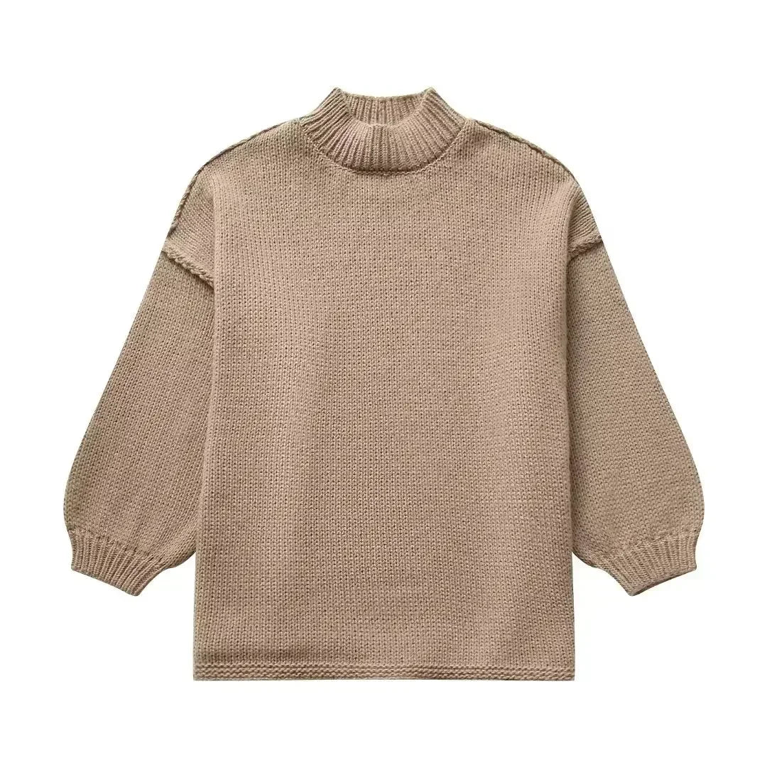 Pull en tricot confortable à col roulé avec manches bouffantes tendance
