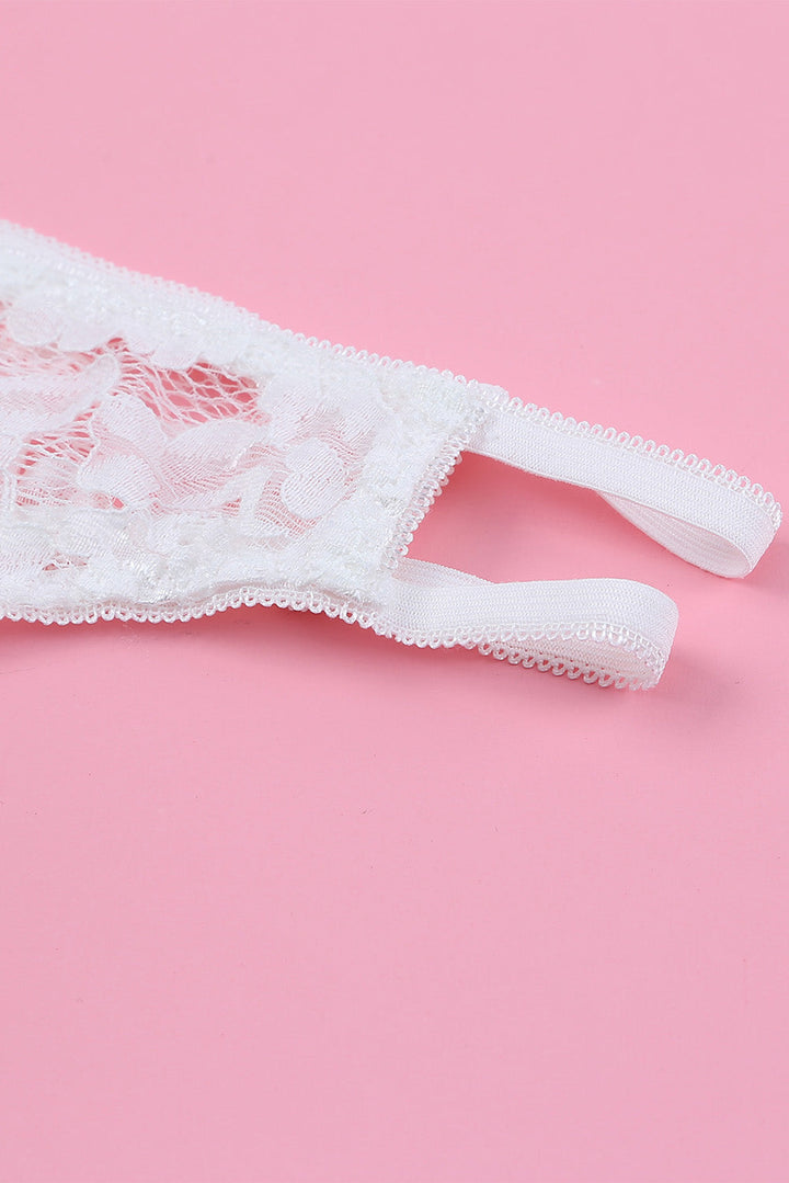 Ensemble de lingerie deux pièces blanc en dentelle à volants avec croisillons