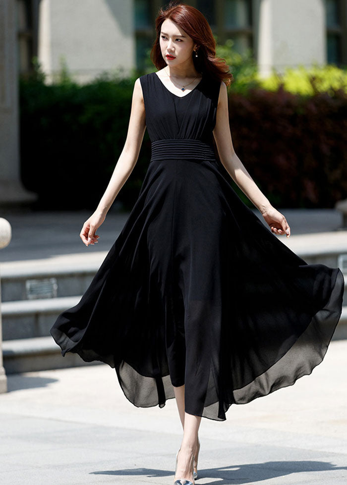 Robe maxi en mousseline blanche sans manches à taille haute