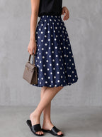Vue arrière du short femme ample à pois contrastés