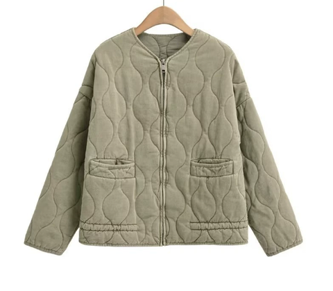 Veste matelassée vintage avec détails de couture classiques