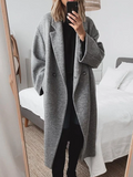 Manteau long élégant à double bouton et coupe ample