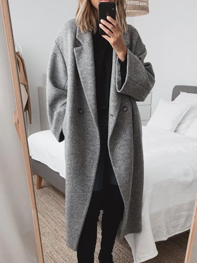 Manteau long élégant à double bouton et coupe ample