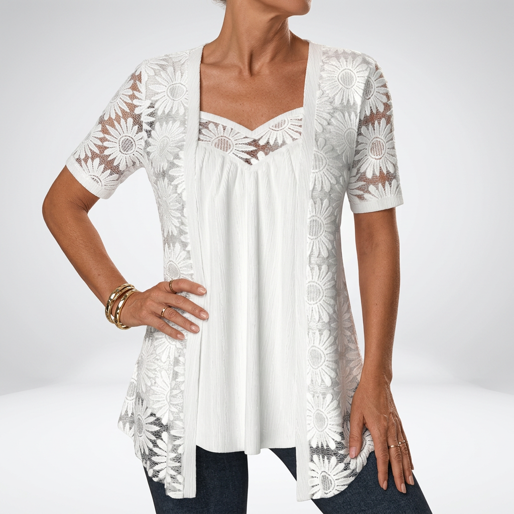 Blouse en dentelle avec broderie florale et encolure en cœur