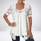 Blouse en dentelle avec broderie florale et encolure en cœur