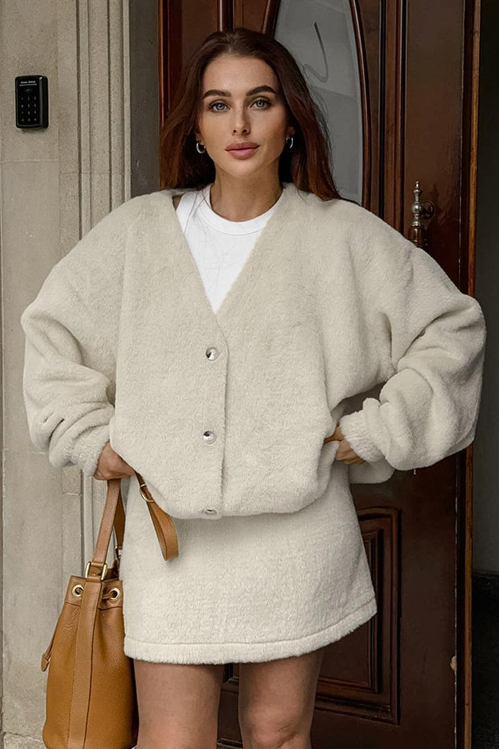 Ensemble chic manteau à manches longues et mini jupe taille haute