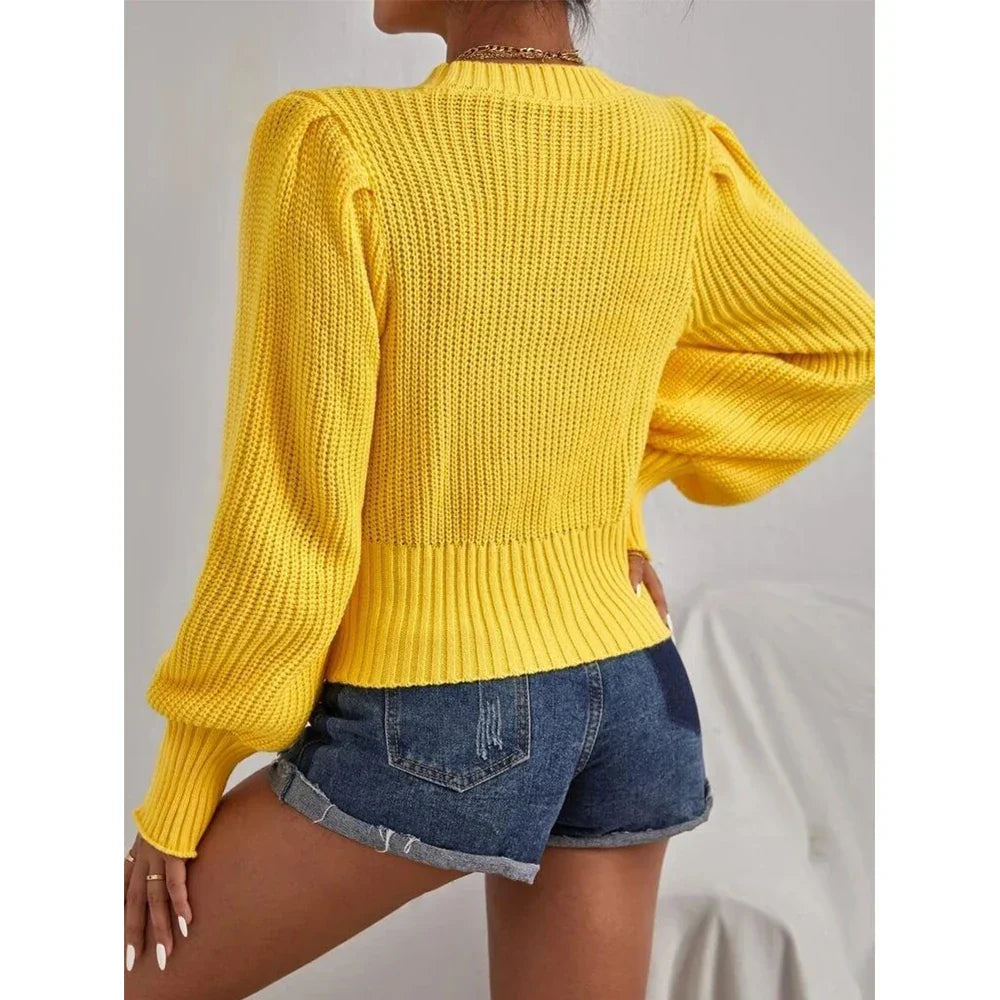 Pull en tricot doux et confortable avec détail élégant en chaîne