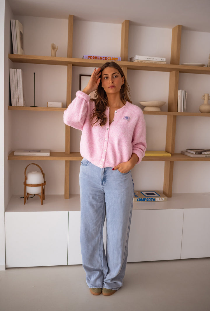Cardigan matelassé chic rose pour looks superposés
