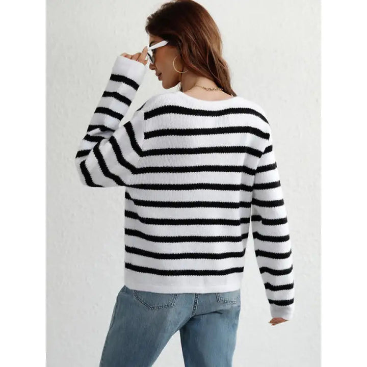 Pull en maille chunky confortable avec boutons et poches latérales