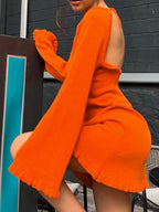 Robe pull en maille à manches longues et dos nu