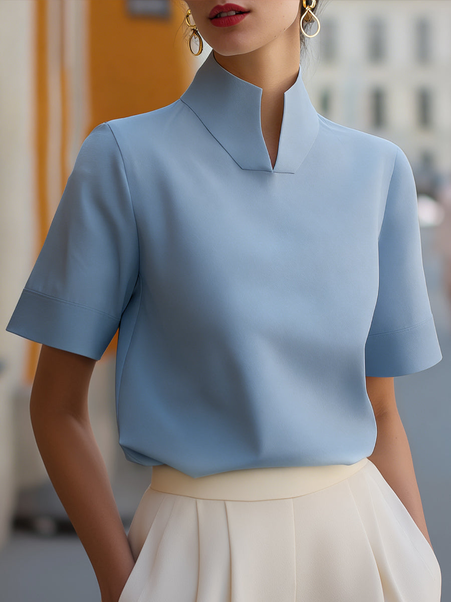 Blouse structurée minimaliste pour femmes à col montant