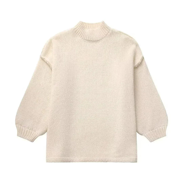 Pull en tricot confortable à col roulé avec manches bouffantes tendance