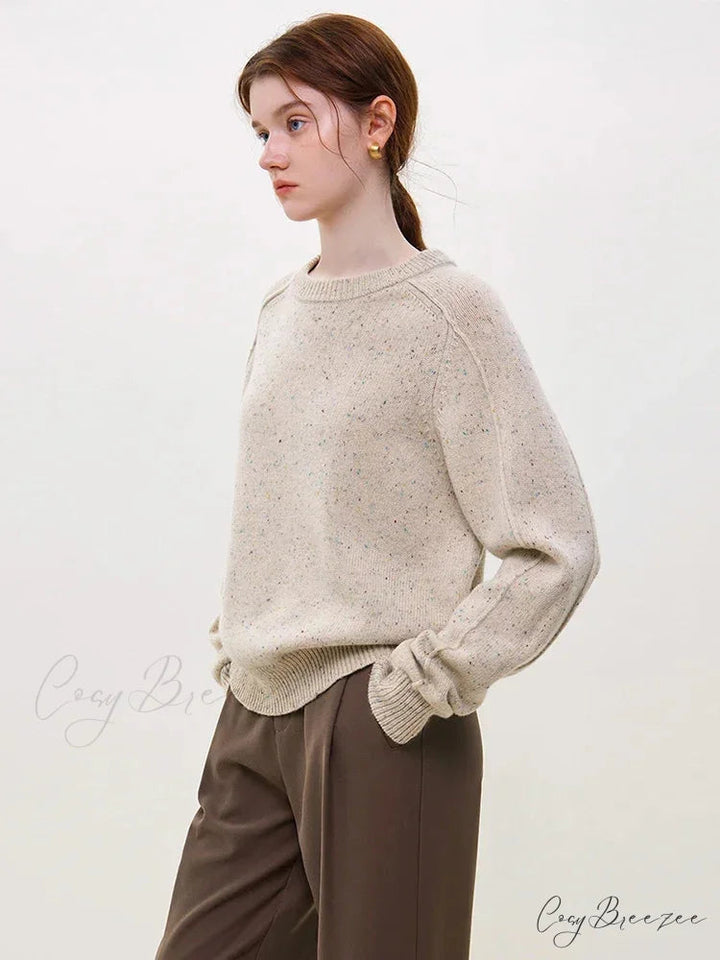 Pull en laine à motif de pois colorés