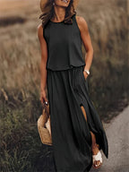 Détail de la robe maxi unie femme et de sa coupe ample