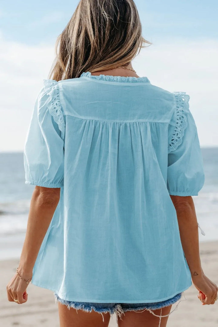 Blouse à manches bouffantes avec bordure en dentelle à œillets pour femmes