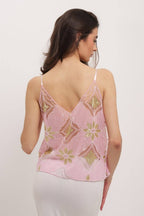 Blouse en tulle transparent brodée noir et or