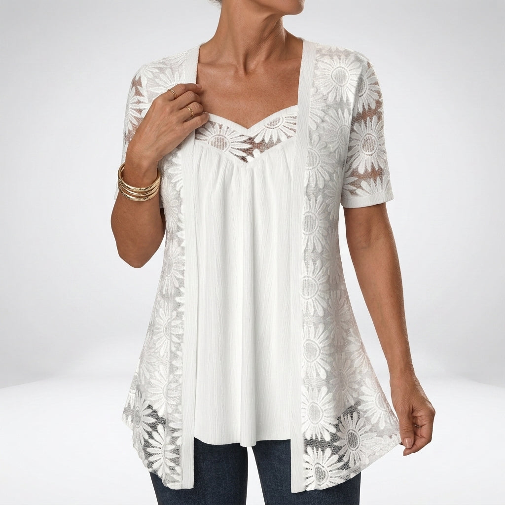 Blouse en dentelle avec broderie florale et encolure en cœur