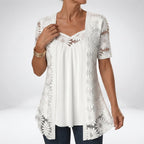 Blouse en dentelle avec broderie florale et encolure en cœur