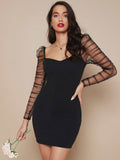 Robe ajustée en maille transparente froncée à manches gigot