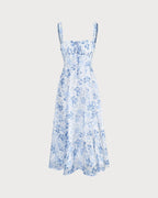 Robe mi-longue bleue à fleurs avec col carré froncé