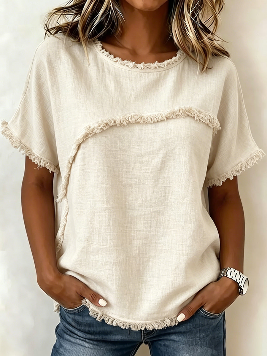 Vue latérale du t-shirt femme ample à col rond et finition frangée