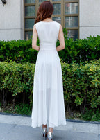 Robe maxi en mousseline blanche sans manches à taille haute