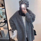 Cardigan tricoté oversized confortable avec fermeture à boutons