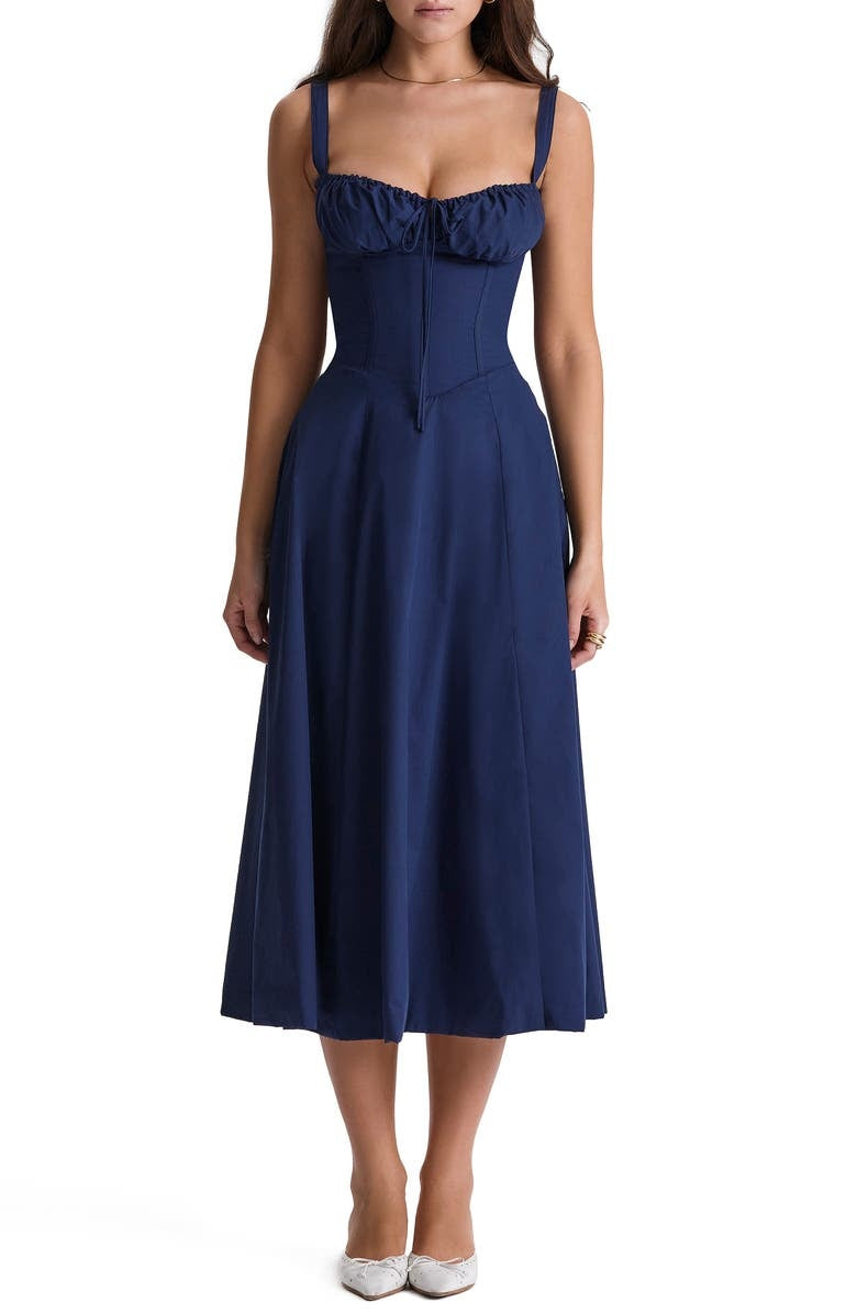 Robe moulante bustier à fleurs et taille découverte