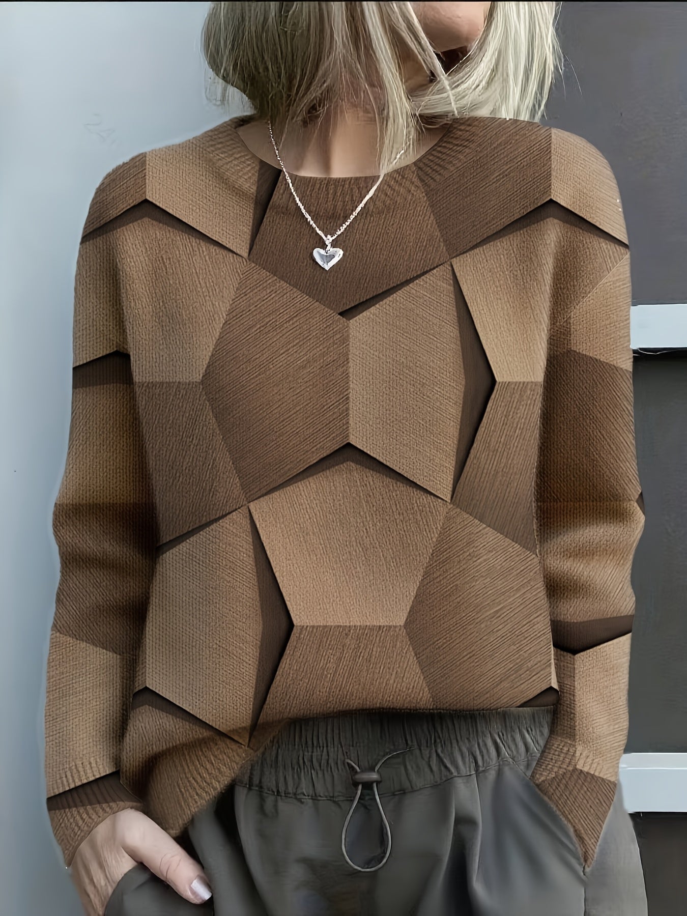 Sweat-shirt en maille confortable avec des imprimés géométriques 3D audacieux
