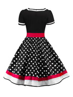 Robe vintage des années 50 à pois avec ceinture et jupe évasée Rockabilly