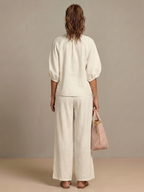 Ensemble blouse zippée et pantalon à jambes larges pour femme