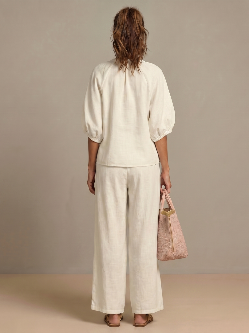 Ensemble blouse zippée et pantalon à jambes larges pour femme