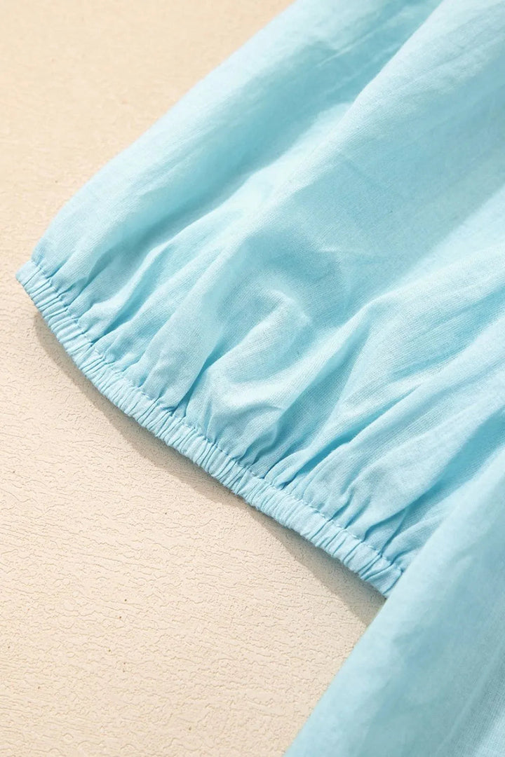 Blouse à manches bouffantes avec bordure en dentelle à œillets pour femmes