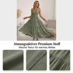 Robe longue dos nu à col halter avec drapés fluides