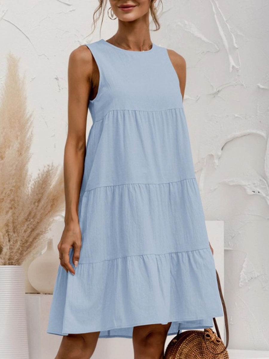 Vue latérale de la robe courte sans manches en couleur unie