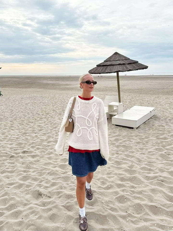 Pull surdimensionné confortable avec détails brodés élégants