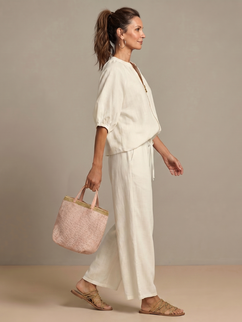 Ensemble blouse zippée et pantalon à jambes larges pour femme