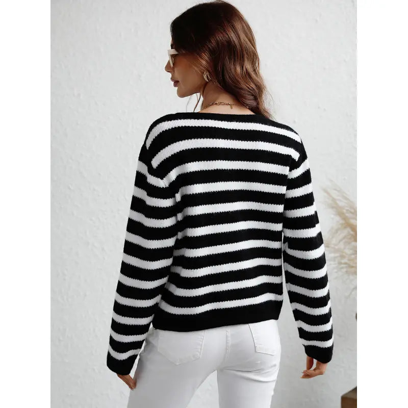 Pull en maille chunky confortable avec boutons et poches latérales