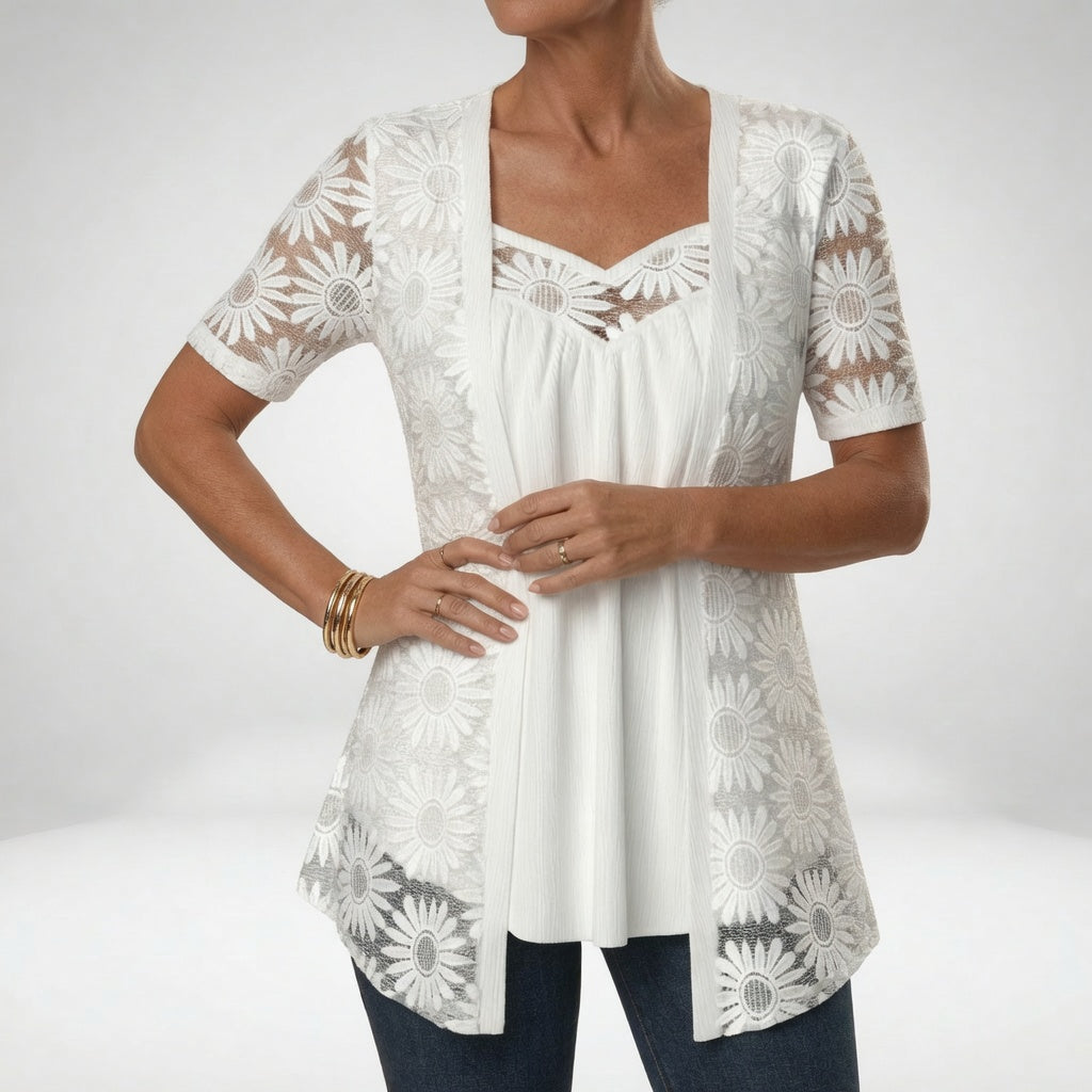 Blouse en dentelle avec broderie florale et encolure en cœur