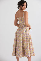 Robe moulante bustier à fleurs et taille découverte