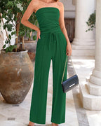 Pantalon large taille haute en maille côtelée porté par un mannequin