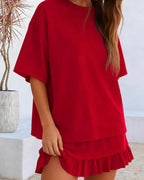 Ensemble femme top col rond et mini jupe porté en pied