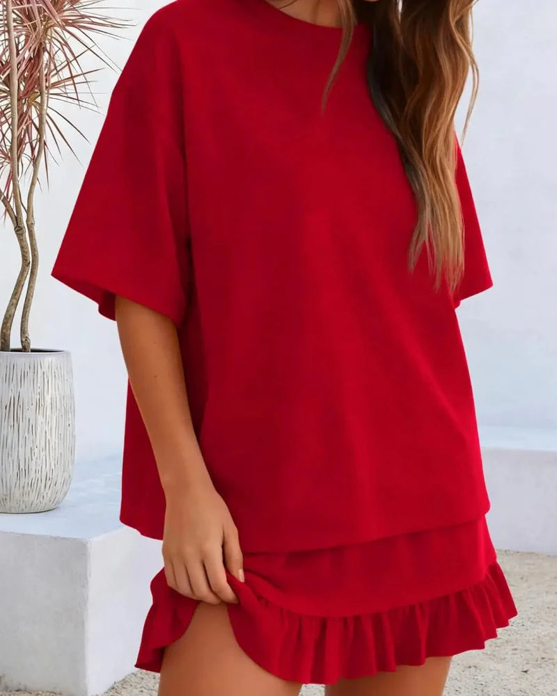 Ensemble femme top col rond et mini jupe porté en pied