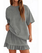 Top à col rond et mini jupe assortie pour femme, vue de profil