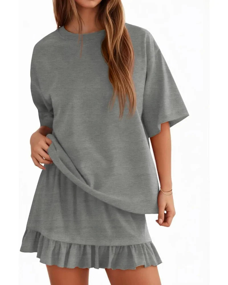 Top à col rond et mini jupe assortie pour femme, vue de profil