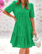 Robe d'été élégante avec détails en dentelle et volants